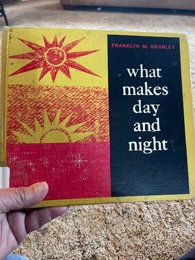 Franklyn M. Branley "What Makes Day and Night" - Yellow, Red, Black Cover